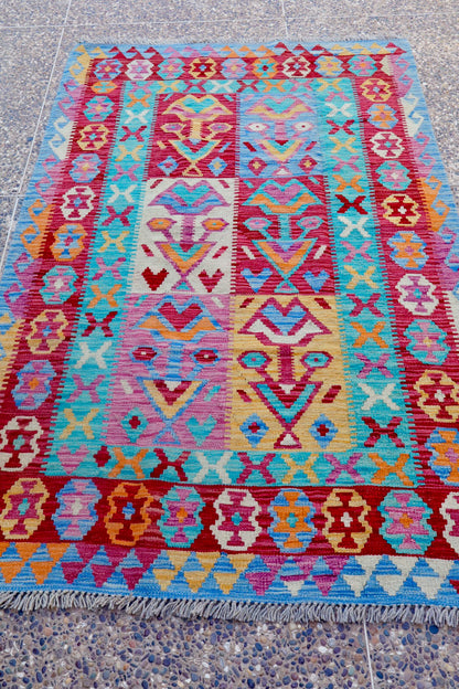 Alfombra de kilim afgano rosa y azul tradicional- 191 x 121 cm