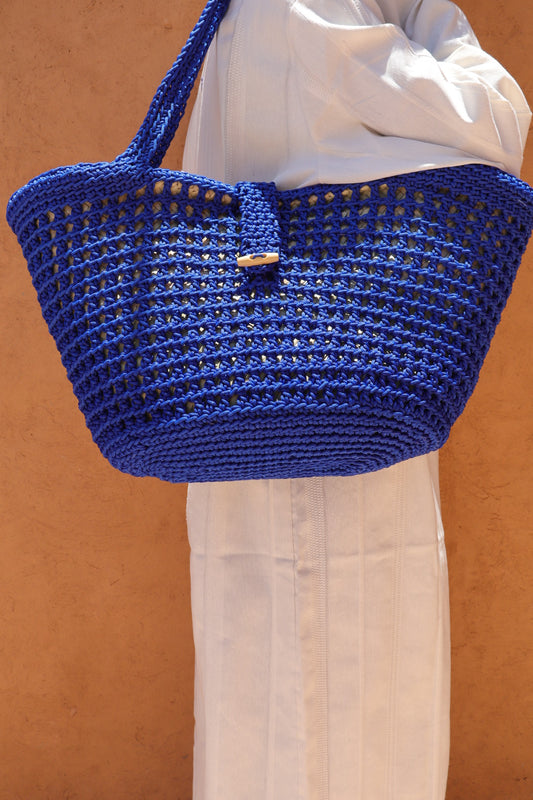 <img src="{{ 'panier-osier-nylon-bleu.jpg' | asset_url }}" alt="Panier en osier et nylon bleu fait main tendance, parfait pour la plage et les sorties quotidiennes, confortable à porter à l'épaule, disponible en plusieurs coloris" title="Panier en osier et nylon bleu fait main">