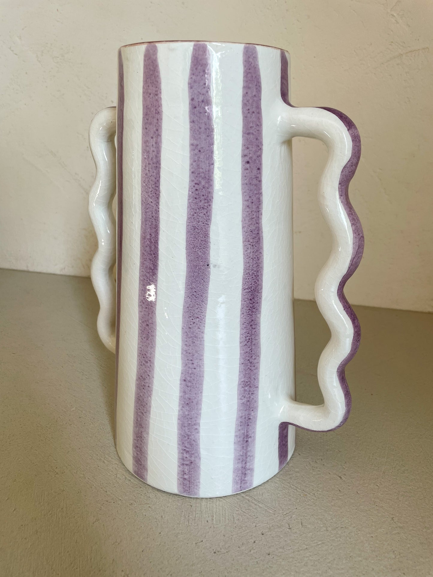 Abstract ceramic vase with lilac and white stripes