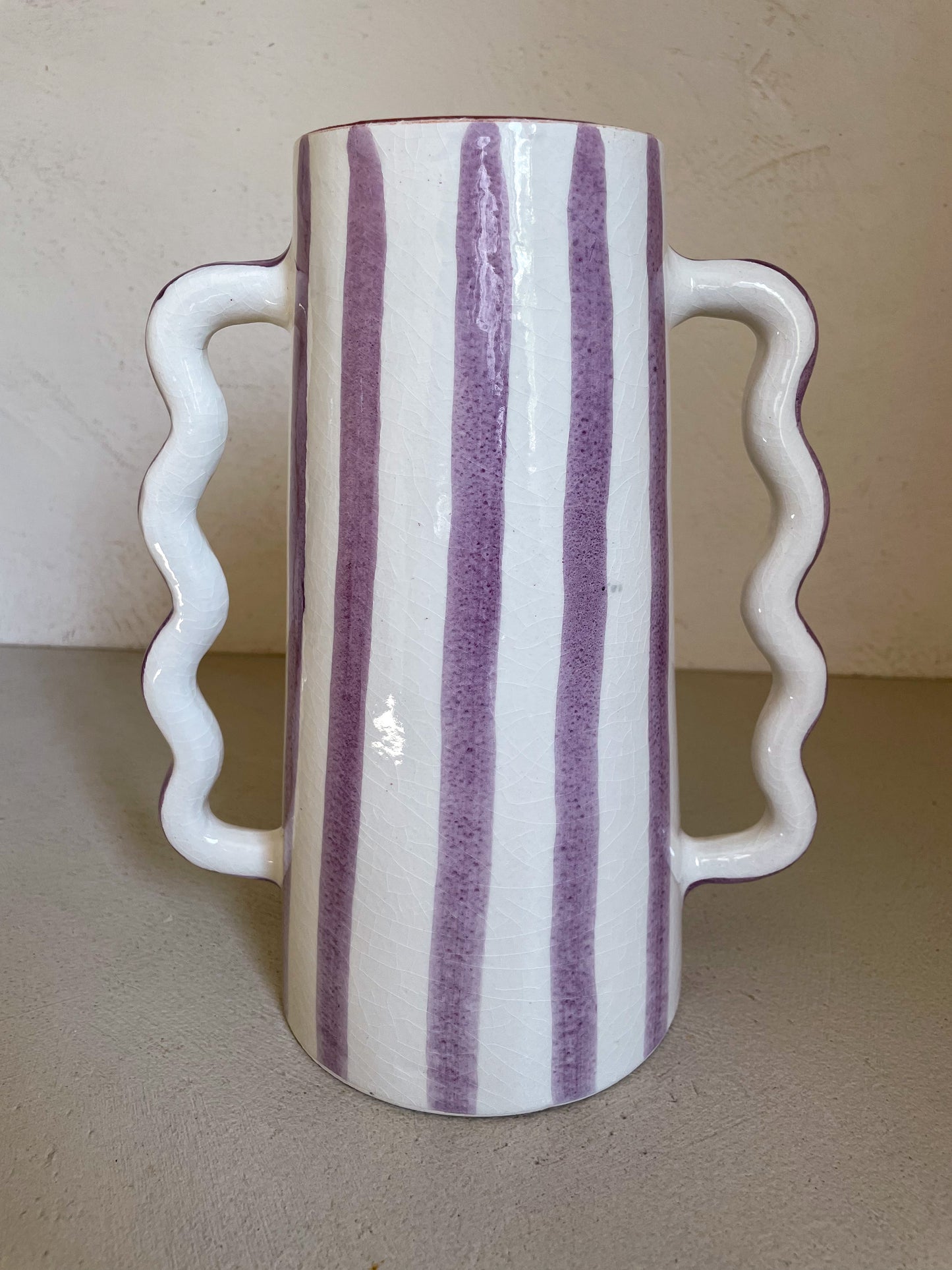 Abstract ceramic vase with lilac and white stripes